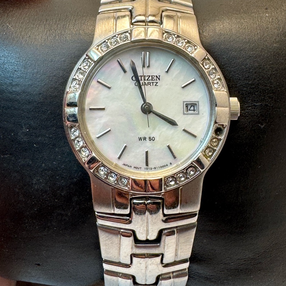 Women’s citizen courts Silvertone band dress watch MOP dial EU2670-56D H33
